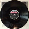 Arthur Baker - Give in to the rhythm prima edizione tedesca in vinile di seconda mano Arthur Baker - Give in to the rhythm prima edizione tedesca in vinile di seconda mano